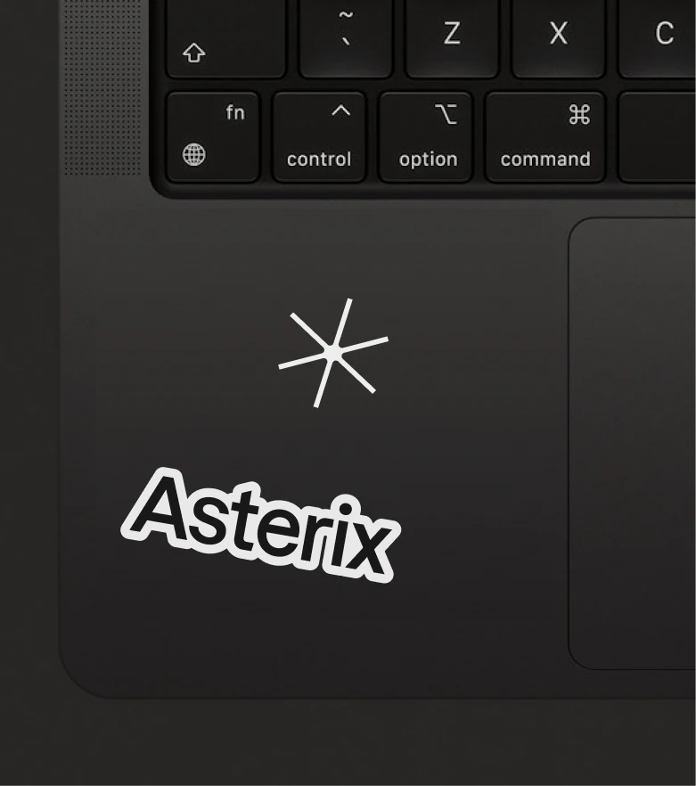 A laptop with Asterix wordmark and asterisk stickers
