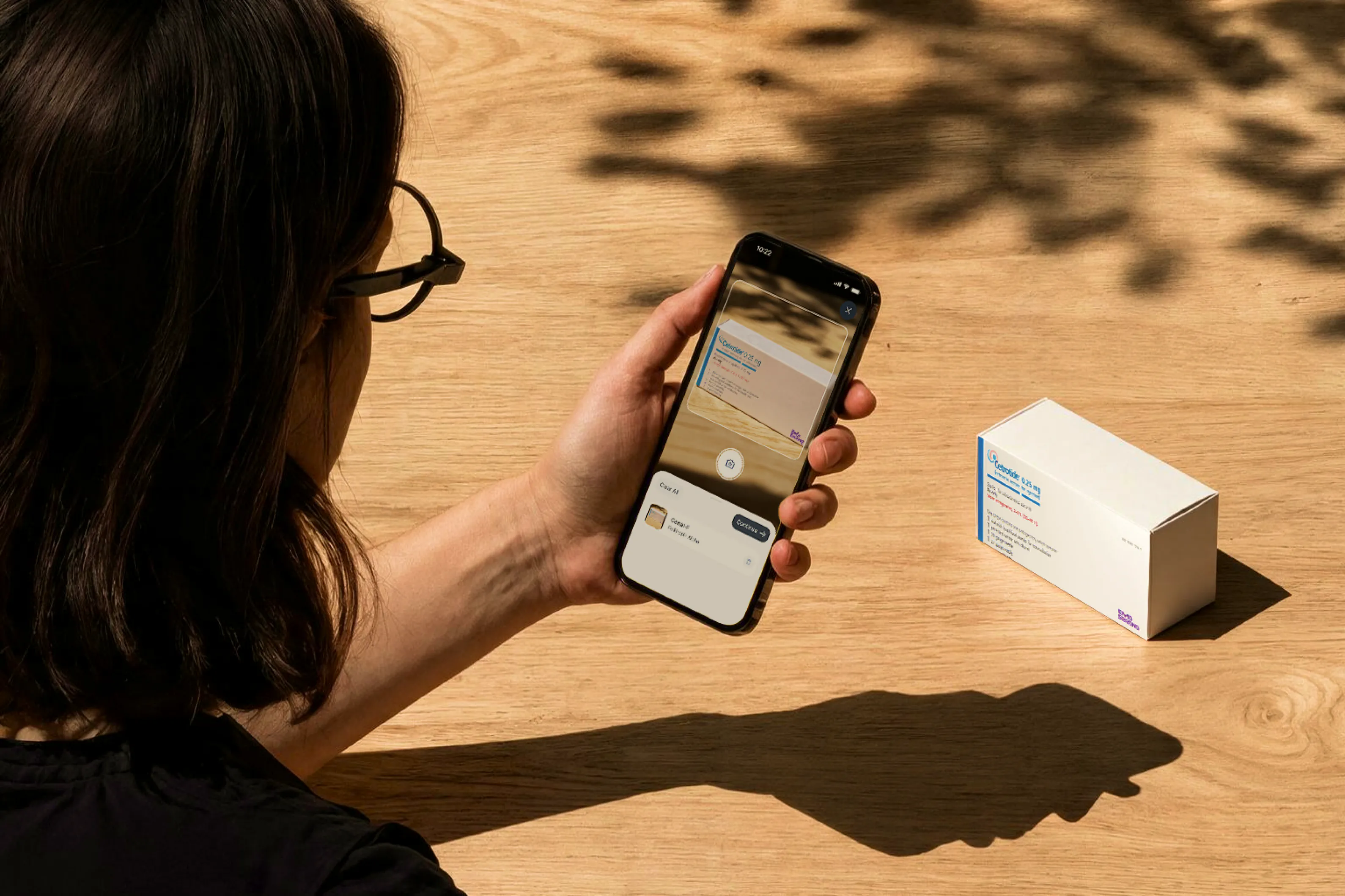 A patient scanning a fertility medication box with the Berry app